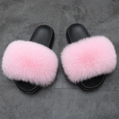 ladies gucci slippers|Gucci fluffy slippers.